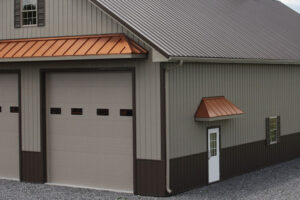 2 door garage with metal siding and roof
