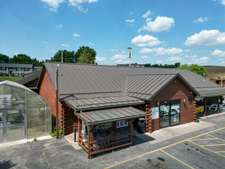 Building with dark G-Rib roof