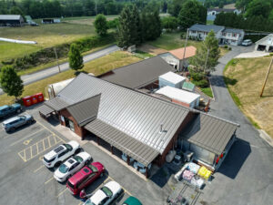 Building with dark G-Rib roof