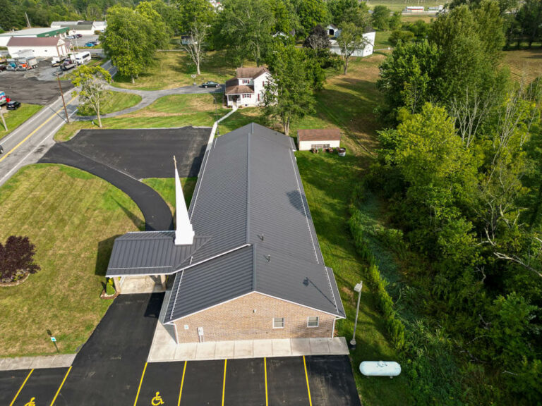 Top view of a Church with black frost standing seam roof