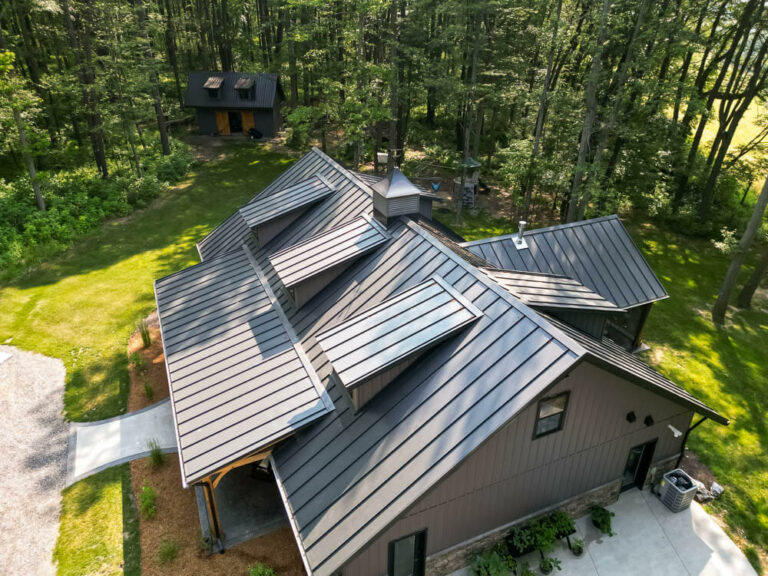 Top view of a house with a matte black standing seam roof