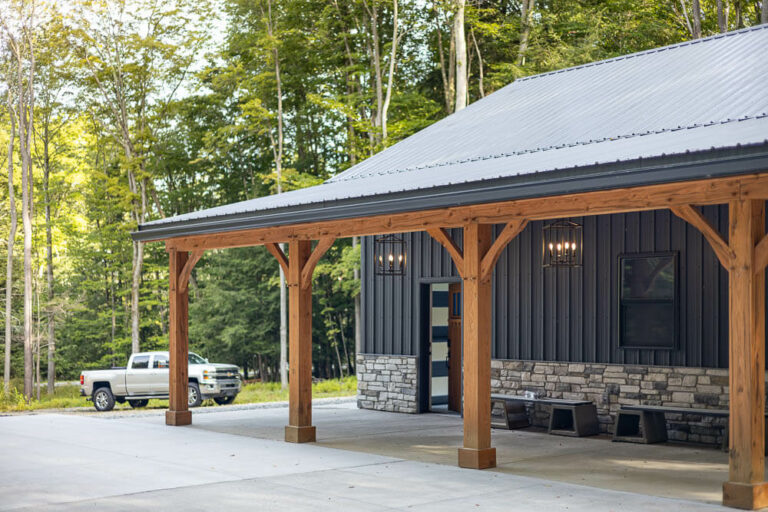 house with a black frost G-Rib roof and siding