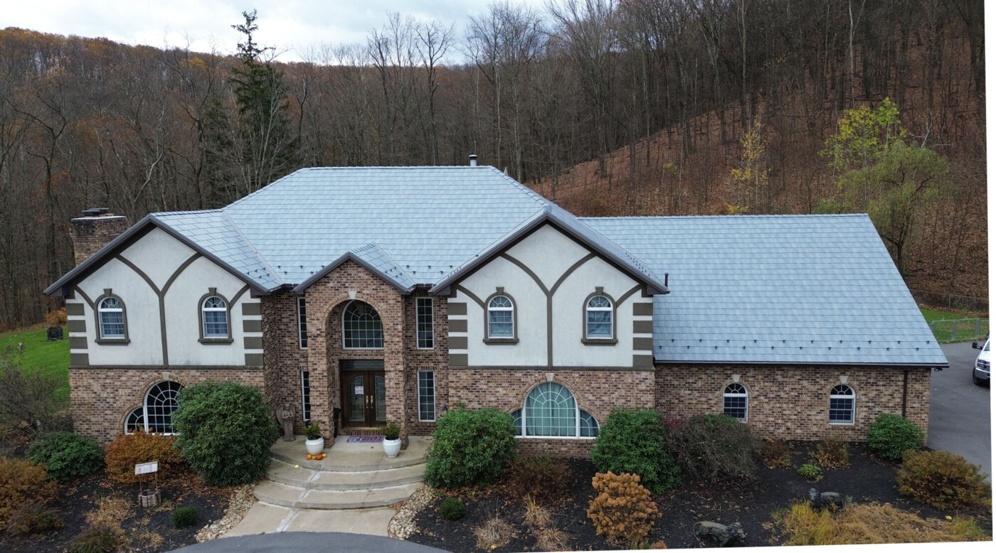 Choice Roofing Centura Premium Panels Slate Rock Blue Pebble Embossed on house